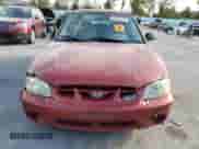 2000 Hyundai Accent with VIN KMHCG35G7YU033965, listed as a Copart auction lot 82433065 with 111,729 mi miles and Salvage title. Bid and sale history available at DreamBid. Image 5.
