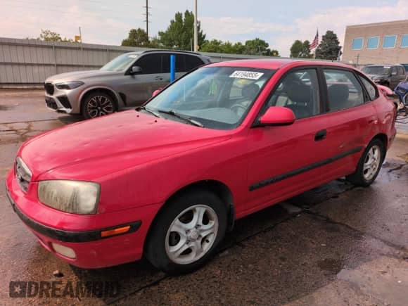 2002 Hyundai Elantra GT z VIN KMHDN55D62U065213, wystawiony jako Copart lot #64194855 z przebiegiem 182 301 mil mil oraz Szkoda całkowita • Salvage title. Historia ofert i sprzedaży dostępna na DreamBid. Obrazek 1.