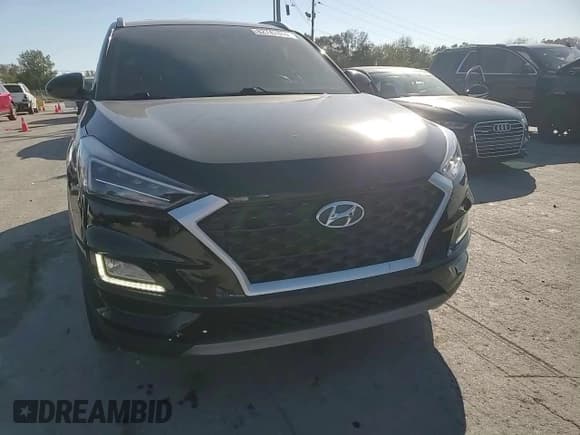 ✅ 2021 Hyundai Tucson Sport • VIN: KM8J33AL2MU282920 • Lot: 82742045. Listed on Copart with 69,409 mi. Free auction sales archive from the USA and detailed vehicle history report at DreamBid. Image 14.