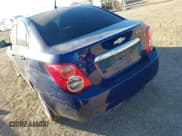 ✅ 2014 Chevrolet Sonic LT • VIN: 1G1JC5SH2E4151507 • Lot: 43611838. Listed on IAAI with 97,460 mi. Free auction sales archive from the USA and detailed vehicle history report at DreamBid. Image 6.