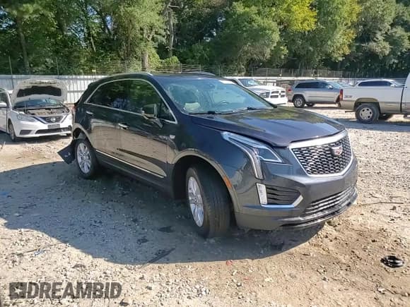 ✅ 2022 Cadillac XT5 FWD Luxury • VIN: 1GYKNAR4XNZ109102 • Лот: 80252475. Опубликован ранее на Copart с пробегом 61 547 миль. Бесплатный доступ к архиву аукционных продаж из США и подробный отчёт об истории автомобиля на DreamBid. Изображение 14.