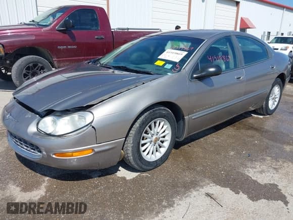 ✅ 1999 Chrysler Concorde • VIN: 2C3HD46J4XH737517 • Lot: 41919869. Listed on IAAI with 514,890 mi. Free auction sales archive from the USA and detailed vehicle history report at DreamBid. Image 2.