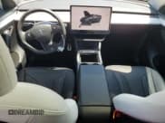 ✅ 2024 Tesla Model Y Long Range • VIN: 7SAYGDEE2RF059384 • Лот: 63147645. Опубликован ранее на Copart с пробегом 18 792 миль. Бесплатный доступ к архиву аукционных продаж из США и подробный отчёт об истории автомобиля на DreamBid. Изображение 8.