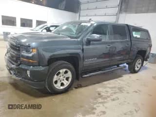2018 Chevrolet Silverado 1500 LT с VIN 3GCUKREC8JG420430, выставлен на аукционе Copart как лот 70853405 с пробегом 142 643 миль миль и Списание • Salvage title. История ставок и продаж доступна на DreamBid. Изображение 1.