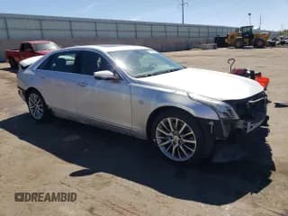 ✅ 2018 Cadillac CT6 Luxury AWD • VIN: 1G6KD5RS4JU130603 • Lot: 71112324. Listed on Copart with 65,734 mi. Free auction sales archive from the USA and detailed vehicle history report at DreamBid. Image 4.