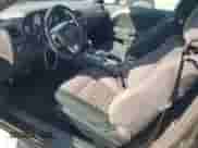 2014 Dodge Challenger SXT z VIN 2C3CDYAG4EH116448, wystawiony jako Copart lot #74385454 z przebiegiem 239 499 mil mil oraz Czysty tytuł • Clean title. Historia ofert i sprzedaży dostępna na DreamBid. Obrazek 8.