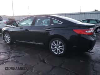 2012 Hyundai Azera z VIN KMHFG4JG0CA156736, wystawiony jako Copart lot #88296255 z przebiegiem 82 364 mil mil oraz Szkoda całkowita • Salvage title. Historia ofert i sprzedaży dostępna na DreamBid. Obrazek 2.