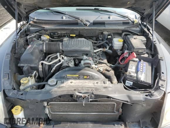 2007 Dodge Dakota SLT z VIN 1D7HW48P37S216293, wystawiony jako Copart lot #70383244 z przebiegiem Nie podano mil oraz Szkoda całkowita • Salvage title. Historia ofert i sprzedaży dostępna na DreamBid. Obrazek 11.