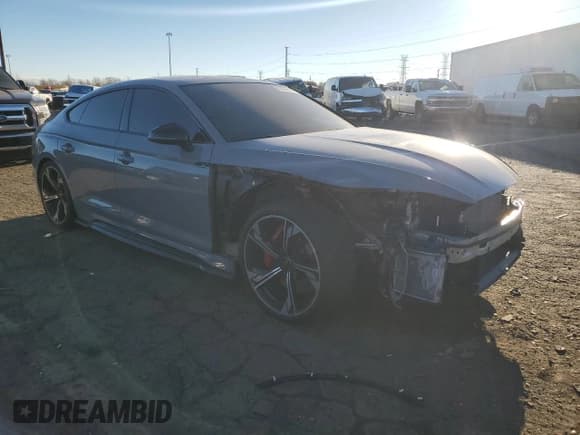 ✅ 2023 Audi RS 5 Sportback • VIN: WUAAWCF56PA900738 • Лот: 92566815. Опубликован ранее на Copart с пробегом 26 456 миль. Бесплатный доступ к архиву аукционных продаж из США и подробный отчёт об истории автомобиля на DreamBid. Изображение 4.