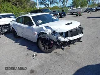 ✅ 2023 Dodge Charger Scat Pack Widebody • VIN: 2C3CDXGJXPH643474 • Lot: 41261253. Listed on IAAI with 9,525 mi. Free auction sales archive from the USA and detailed vehicle history report at DreamBid. Image 1.