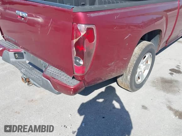 2010 Chevrolet Colorado 1LT z VIN 1GCESCD93A8100185, wystawiony jako IAAI lot #41471766 z przebiegiem 196 946 mil mil oraz . Historia ofert i sprzedaży dostępna na DreamBid. Obrazek 13.