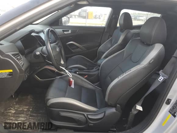 ✅ 2017 Hyundai Veloster Turbo • VIN: KMHTC6AE2HU310054 • Лот: 63442184. Размещён на Copart с пробегом 103 960 миль миль. Получите бесплатный доступ к архиву аукционных продаж из США и посмотрите подробный отчёт об истории автомобиля на DreamBid. Изображение 7.