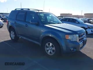 ✅ 2010 Ford Escape Limited • VIN: 1FMCU9E76AKC03441 • Lot: 43881706. Listed on IAAI with 104,859 mi. Free auction sales archive from the USA and detailed vehicle history report at DreamBid. Image 1.