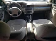 ✅ 2004 Chrysler Sebring Touring • VIN: 1C3AL56R64N291602 • Лот: 71096534. Опубликован ранее на Copart с пробегом 98 772 миль. Бесплатный доступ к архиву аукционных продаж из США и подробный отчёт об истории автомобиля на DreamBid. Изображение 8.