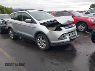 ✅ 2014 Ford Escape SE • VIN: 1FMCU9G92EUE43062 • Lot: 43461798. Listed on IAAI with 121,420 mi. Free auction sales archive from the USA and detailed vehicle history report at DreamBid. Image 1.