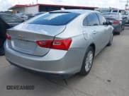 ✅ 2018 Chevrolet Malibu LT • VIN: 1G1ZD5ST0JF143540 • Lot: 42737601. Listed on IAAI with 142,193 mi. Free auction sales archive from the USA and detailed vehicle history report at DreamBid. Image 4.
