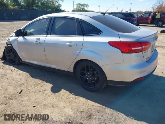 ✅ 2016 Ford Focus SE • VIN: 1FADP3F2XGL243059 • Lot: 43573859. Listed on IAAI with 104,132 mi. Free auction sales archive from the USA and detailed vehicle history report at DreamBid. Image 3.