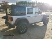 ✅ 2023 Jeep Wrangler Rubicon • VIN: 1C4JJXR61PW630974 • Lot: 90245445. Listed on Copart with 57,589 mi. Free auction sales archive from the USA and detailed vehicle history report at DreamBid. Image 3.