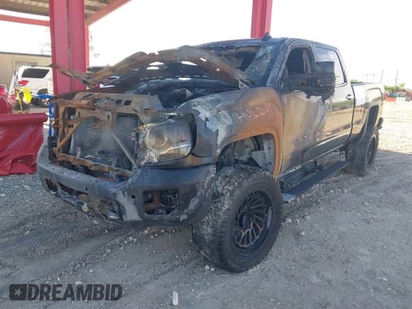 ✅ 2018 GMC Sierra 2500HD Denali • VIN: 1GT12UEY9JF118115 • Лот: 41193403. Опубликован ранее на IAAI с пробегом Не указан. Бесплатный доступ к архиву аукционных продаж из США и подробный отчёт об истории автомобиля на DreamBid. Изображение 2.