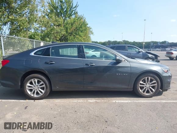 ✅ 2018 Chevrolet Malibu LT • VIN: 1G1ZD5STXJF119746 • Lot: 43173441. Listed on IAAI with 92,484 mi. Free auction sales archive from the USA and detailed vehicle history report at DreamBid. Image 13.