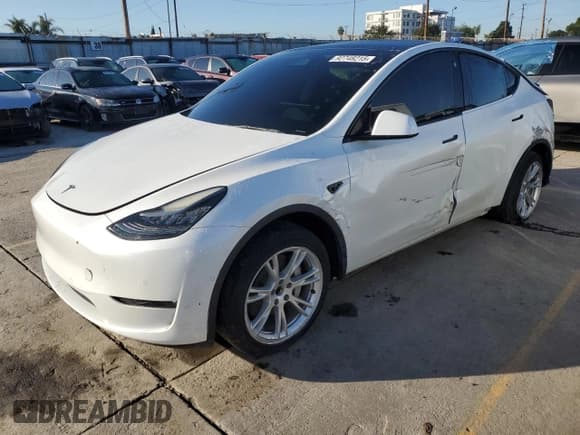 ✅ 2021 Tesla Model Y Standard Range • VIN: 5YJYGDED2MF103025 • Лот: 92748215. Опубликован ранее на Copart с пробегом 54 115 миль. Бесплатный доступ к архиву аукционных продаж из США и подробный отчёт об истории автомобиля на DreamBid. Изображение 1.
