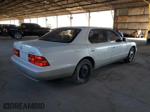 ✅ 1998 Lexus LS 400 • VIN: JT8BH28F1W0120936 • Лот: 77228464. Опубликован ранее на Copart с пробегом 274 013 миль. Бесплатный доступ к архиву аукционных продаж из США и подробный отчёт об истории автомобиля на DreamBid. Изображение 3.