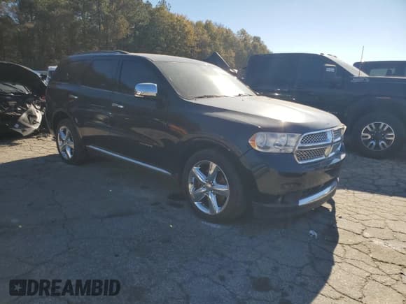 ✅ 2013 Dodge Durango Citadel • VIN: 1C4SDHETXDC661103 • Lot: 83579674. Listed on Copart with 173,543 mi. Free auction sales archive from the USA and detailed vehicle history report at DreamBid. Image 4.