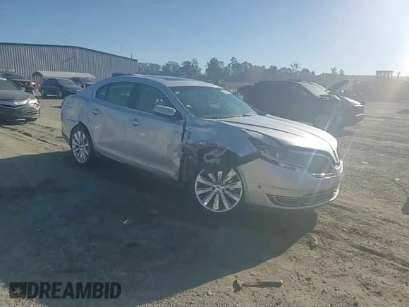 ✅ 2014 Lincoln MKS EcoBoost • VIN: 1LNHL9FT3EG600411 • Lot: 86684605. Listed on Copart with 76,702 mi. Free auction sales archive from the USA and detailed vehicle history report at DreamBid. Image 13.