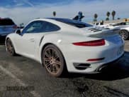 ✅ 2014 Porsche 911 Turbo • VIN: WP0AD2A99ES166661 • Lot: 92766905. Listed on Copart with 38,574 mi. Free auction sales archive from the USA and detailed vehicle history report at DreamBid. Image 2.