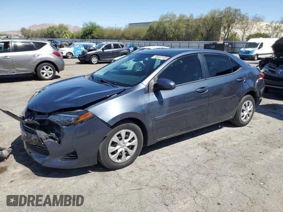 ✅ 2018 Toyota Corolla LE Eco • VIN: 2T1BPRHE9JC021851 • Лот: 66487125. Опубликован ранее на Copart с пробегом 99 515 миль. Бесплатный доступ к архиву аукционных продаж из США и подробный отчёт об истории автомобиля на DreamBid. Изображение 1.