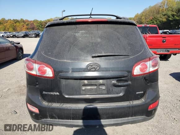 2012 Hyundai Santa Fe SE с VIN 5XYZHDAG2CG127768, выставлен на аукционе Copart как лот 77075924 с пробегом 149 980 миль миль и Чистый • Clean title. История ставок и продаж доступна на DreamBid. Изображение 6.