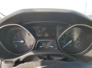 ✅ 2015 Ford Focus Titanium • VIN: 1FADP3N25FL211247 • Lot: 48327205. Wystawiony na Copart z przebiegiem 101 556 mil. Bezpłatny archiwum sprzedaży aukcyjnych z USA i szczegółowy raport historii pojazdu na DreamBid. Zdjęcie 9.