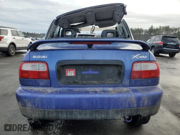 ✅ 1997 Suzuki X-90 • VIN: JS3LB11S7V4100188 • Lot: 86440804. Wystawiony na Copart z przebiegiem Nie podano. Bezpłatny archiwum sprzedaży aukcyjnych z USA i szczegółowy raport historii pojazdu na DreamBid. Zdjęcie 6.