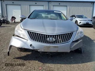 ✅ 2014 Hyundai Azera Limited • VIN: KMHFH4JG9EA399963 • Лот: 66930185. Опубликован ранее на Copart с пробегом 63 879 миль. Бесплатный доступ к архиву аукционных продаж из США и подробный отчёт об истории автомобиля на DreamBid. Изображение 5.