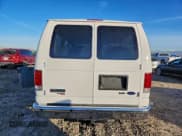 ✅ 2011 Ford Econoline Passenger XLT • VIN: 1FBNE3BLXBDB21960 • Lot: 96014155. Listed on Copart with 124,428 mi. Free auction sales archive from the USA and detailed vehicle history report at DreamBid. Image 6.