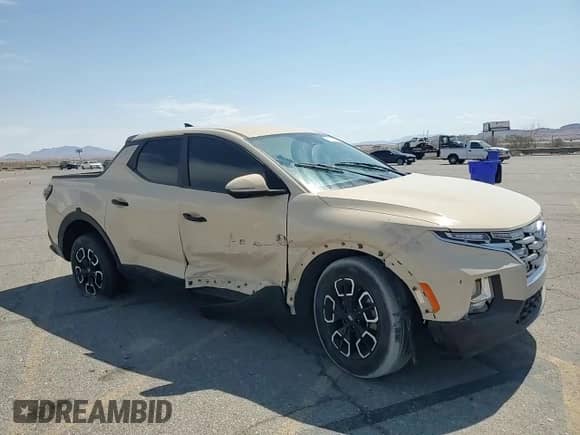 2022 Hyundai Santa Cruz SEL с VIN 5NTJB4AE6NH007563, выставлен на аукционе Copart как лот 70716154 с пробегом 18 023 миль миль и Списание • Salvage title. История ставок и продаж доступна на DreamBid. Изображение 10.