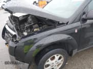 ✅ 2003 Saturn VUE • VIN: 5GZCZ53B73S910233 • Lot: 41719718. Wystawiony na IAAI z przebiegiem 188 852 mil. Bezpłatny archiwum sprzedaży aukcyjnych z USA i szczegółowy raport historii pojazdu na DreamBid. Zdjęcie 13.