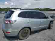 2012 Hyundai Santa Fe SE z VIN 5XYZH4AG0CG097914, wystawiony jako Copart lot #67776104 z przebiegiem 166 992 mil mil oraz Szkoda całkowita • Salvage title. Historia ofert i sprzedaży dostępna na DreamBid. Obrazek 3.