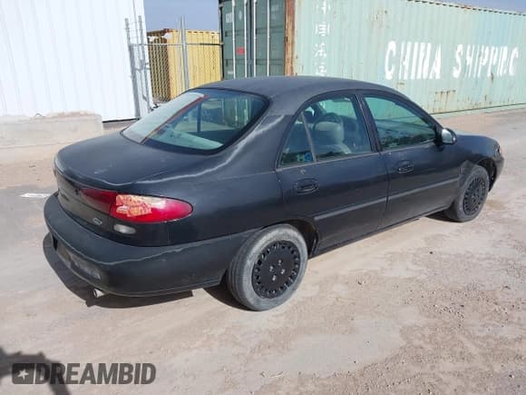 ✅ 1998 Ford Escort LX • VIN: 1FAFP10P5WW237944 • Lot: 42239266. Listed on IAAI with 238,540 mi. Free auction sales archive from the USA and detailed vehicle history report at DreamBid. Image 4.