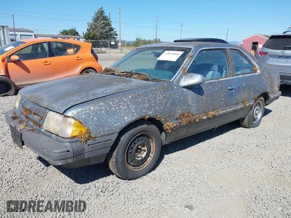 ✅ 1986 Ford Tempo • VIN: 1FABP19X3GK112046 • Lot: 42820868. Wystawiony na IAAI z przebiegiem 23 944 mil. Bezpłatny archiwum sprzedaży aukcyjnych z USA i szczegółowy raport historii pojazdu na DreamBid. Zdjęcie 2.