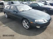 ✅ 1993 Lexus SC • VIN: JT8JZ31C3P0011488 • Lot: 66694985. Wystawiony na Copart z przebiegiem 127 210 mil. Bezpłatny archiwum sprzedaży aukcyjnych z USA i szczegółowy raport historii pojazdu na DreamBid. Zdjęcie 4.
