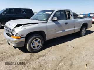 1999 Dodge Dakota SLT z VIN 1B7GL22X8XS145362, wystawiony jako Copart lot #73281704 z przebiegiem Nie podano mil oraz Szkoda całkowita • Salvage title. Historia ofert i sprzedaży dostępna na DreamBid. Obrazek 1.