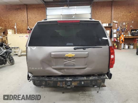 2013 Chevrolet Tahoe LTZ z VIN 1GNSKCE08DR158317, wystawiony jako Copart lot #80697885 z przebiegiem 169 471 mil mil oraz Szkoda całkowita • Salvage title. Historia ofert i sprzedaży dostępna na DreamBid. Obrazek 6.