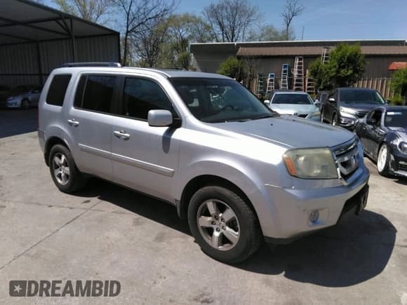 ✅ 2010 Honda Pilot EX-L • VIN: 5FNYF3H54AB006261 • Lot: 42009415. Listed on IAAI with 259,747 mi. Free auction sales archive from the USA and detailed vehicle history report at DreamBid. Image 1.