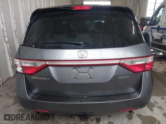 ✅ 2012 Honda Odyssey Touring • VIN: 5FNRL5H92CB106325 • Lot: 43287538. Listed on IAAI with 206,962 mi. Free auction sales archive from the USA and detailed vehicle history report at DreamBid. Image 16.