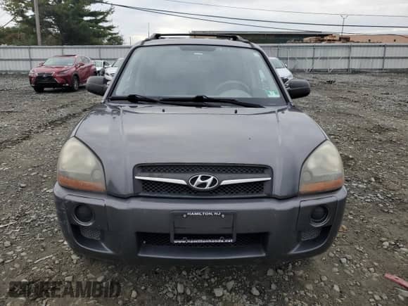 2009 Hyundai Tucson GLS z VIN KM8JM12B39U952327, wystawiony jako Copart lot #73695884 z przebiegiem 142 752 mil mil oraz Szkoda całkowita • Salvage title. Historia ofert i sprzedaży dostępna na DreamBid. Obrazek 5.