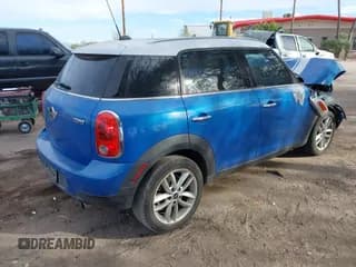 ✅ 2014 MINI Countryman • VIN: WMWZB3C59EWR42172 • Lot: 43704575. Listed on IAAI with 113,453 mi. Free auction sales archive from the USA and detailed vehicle history report at DreamBid. Image 4.