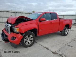 ✅ 2015 GMC Canyon 2WD SLE • VIN: 1GTH5BEA6F1142406 • Lot: 72416354. Listed on Copart with 121,670 mi. Free auction sales archive from the USA and detailed vehicle history report at DreamBid. Image 1.