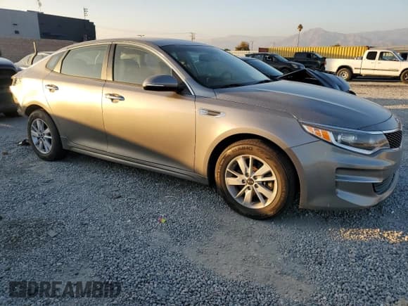 ✅ 2016 Kia Optima LX • VIN: 5XXGT4L39GG074268 • Lot: 90731305. Listed on Copart with 74,909 mi. Free auction sales archive from the USA and detailed vehicle history report at DreamBid. Image 4.