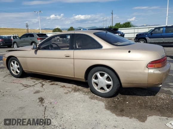 ✅ 1995 Lexus SC • VIN: JT8JZ31C3S0027215 • Lot: 65973455. Wystawiony na Copart z przebiegiem 81 908 mil. Bezpłatny archiwum sprzedaży aukcyjnych z USA i szczegółowy raport historii pojazdu na DreamBid. Zdjęcie 2.